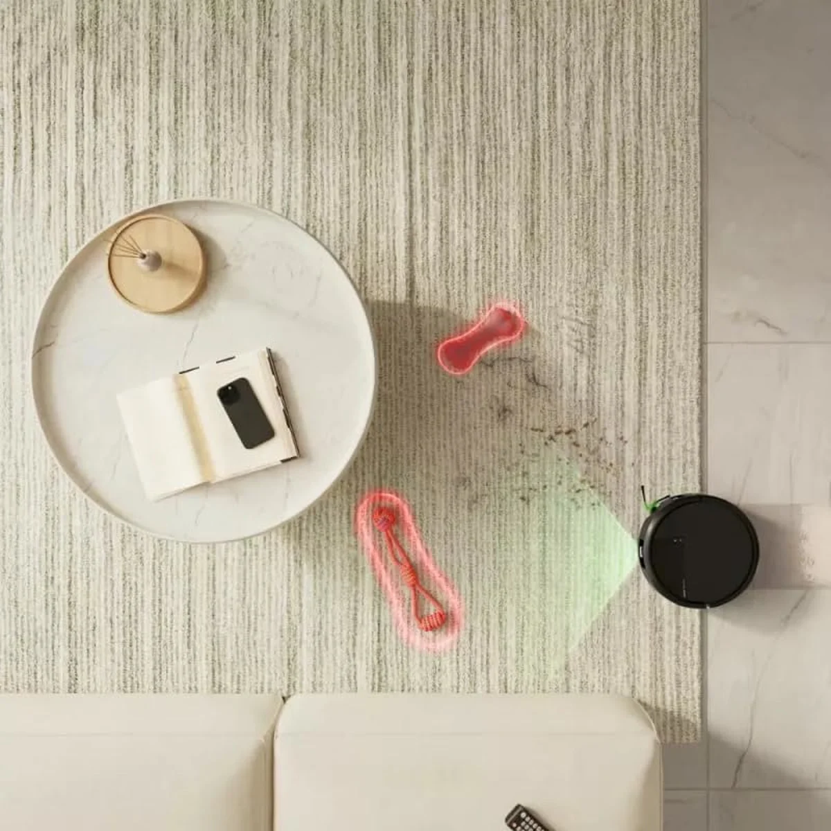 Le Roomba Plus 576 nettoie autour d’une table basse