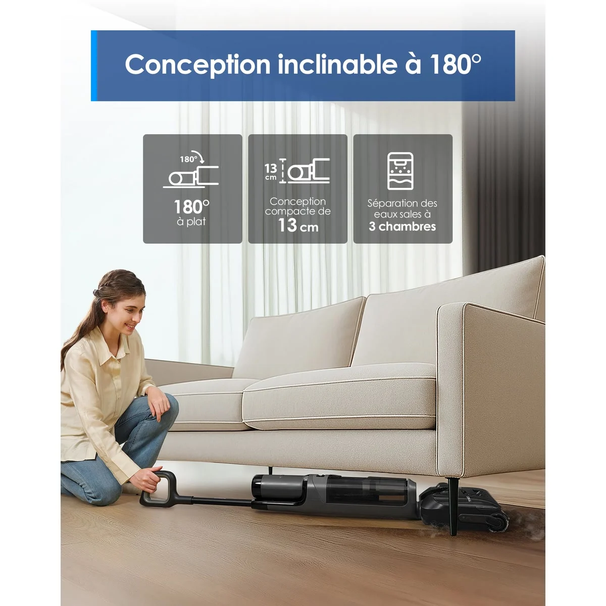 Le Tineco i6 Stretch couché à plat sous un canapé